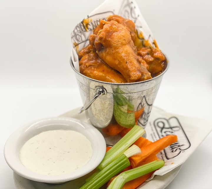 This image depicts a bucket of Legendary Hot Wings that are one of our staple menu items. Servings come in Taster (6pcs), Small (12pcs), Large (24pcs), or Bucket (48pcs)